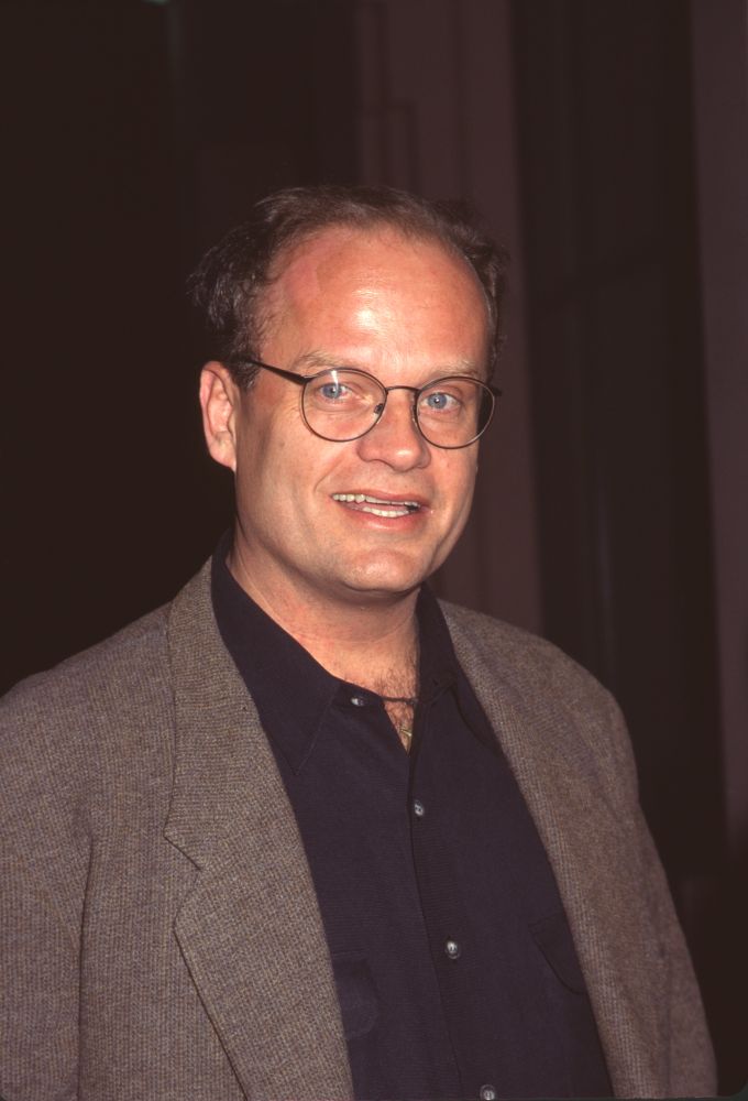 Kelsey Grammer smiling wearing a tweed blazer and black shirt photo print