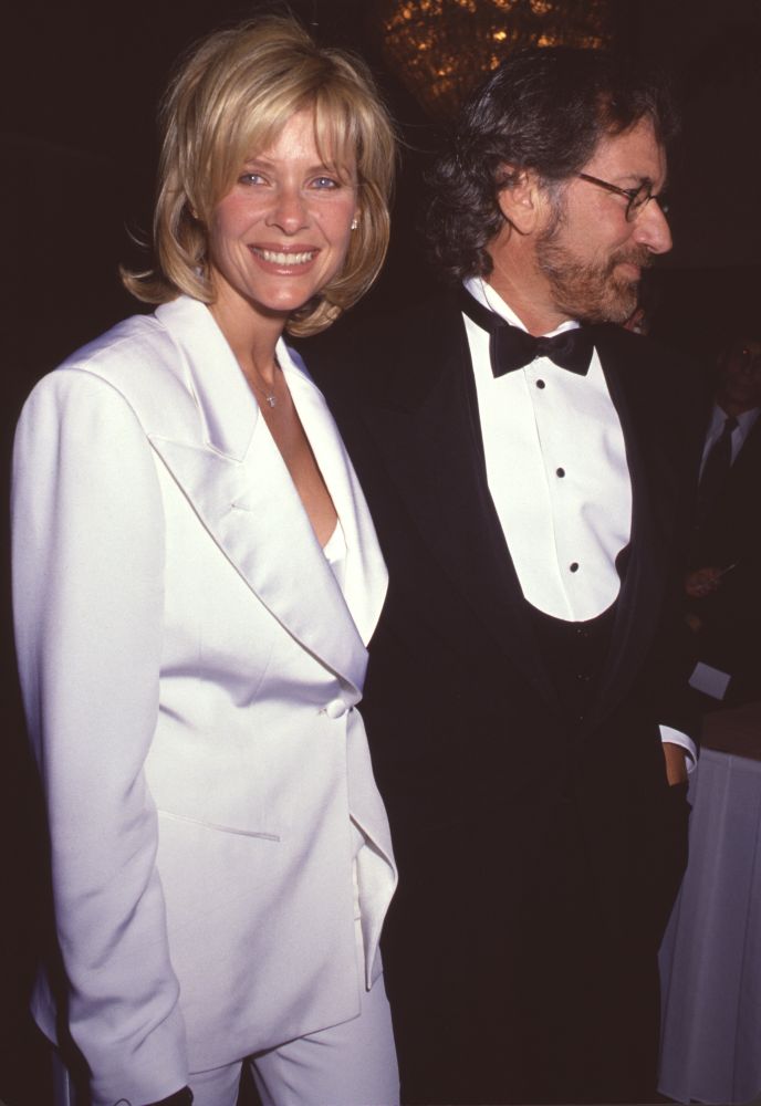 Kate Capshaw smiling in a white suit with Steven Spielberg photo print.
