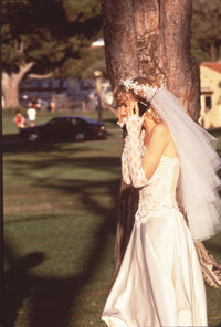 Laura Dern in wedding dress talking on the phone photo print