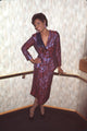Lisa Canning leaning on a rail in a sparkle suit photo print.