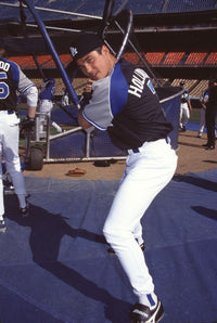 Dean Cain Batting Pose Photo Print showcasing dynamic action.