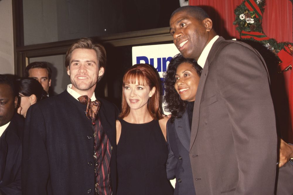Jim Carrey and Lauren Holly at the 'Dumb and Dumber' premiere photo print.