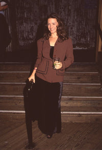 Kristin Davis wearing a black velvet skirt and brown blazer - photo print