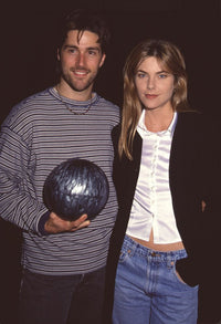 Matthew Fox holding a bowling ball with Paula Devico in white silk shirt photo print.