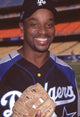 Rocky Carroll in Dodgers uniform holding mitt - Hollywood Stars Night Photo Print