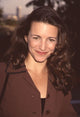 Kristin Davis smiling in a brown jacket photo print.
