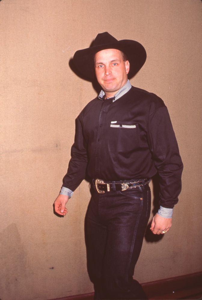 Garth Brooks photo print in black with checkered cuffs and collar.