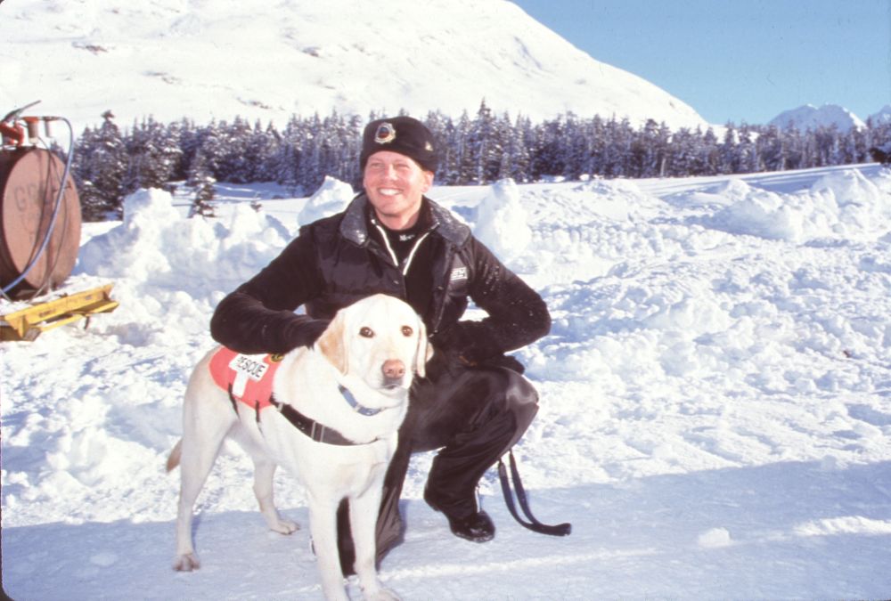 Ian Ziering photo print in snow with yellow lab