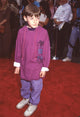 Adam Hann-Byrd at the 'Little Man' premiere wearing purple pants and a striped hoodie - Photo Print