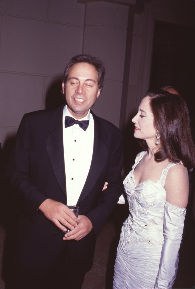 Brandon Tartikoff in tuxedo with wife Lilly in white gown photo print.