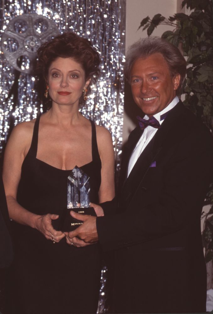 Susan Sarandon holding her award at the 1996 Palm Springs Film Festival - Photo Print