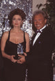 Susan Sarandon holding her award at the 1996 Palm Springs Film Festival - Photo Print