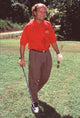 Kelsey Grammer golfing in a red polo and brown pants photo print