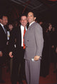 Mark Canton in black suit with Peter Guber in gray suit photo print