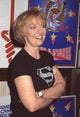 K Callan Closeup in Superman shirt with arms crossed photo print