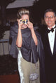 Sharon Stone taking pictures at the 54th Golden Globes photo print.