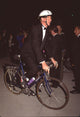 Ed Begley Jr. riding bike in tuxedo at Vanity Fair Oscar Party photo print.