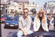 Luke Perry and Claudia Schiffer sitting in a convertible at the World Music Awards photo print.
