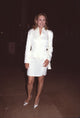 Faye Dunaway in an elegant all white floral skirt suit photo print.