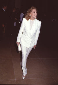 Faye Dunaway elegant photo print in white pant suit and clutch.