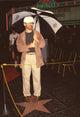 Steven Spielberg holding umbrella photo print