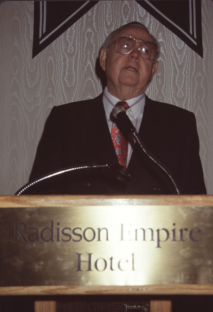 Kurt Carlson Speaking at Podium Photo Print