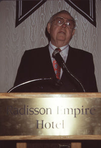 Kurt Carlson Speaking at Podium Photo Print