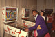 Clifton Davis Playing Pinball Photo Print showcasing a fun moment.