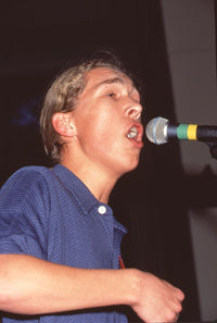 Isaac Hanson Performing Photo Print showcasing live music energy.