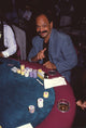 Cheech Marin giving a peace sign at poker table photo print
