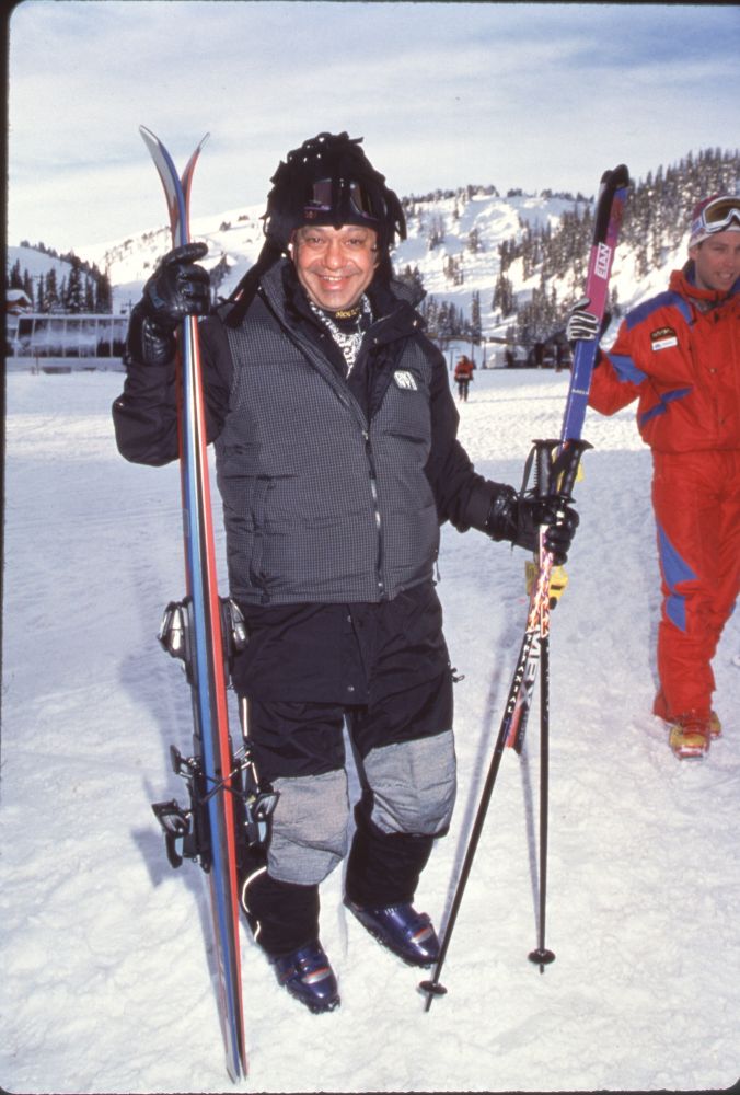 Cheech Marin holding skis photo print