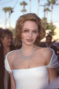 Angelina Jolie photo print in white off-shoulder top with diamond necklace