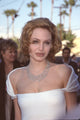 Angelina Jolie photo print in white off-shoulder top with diamond necklace
