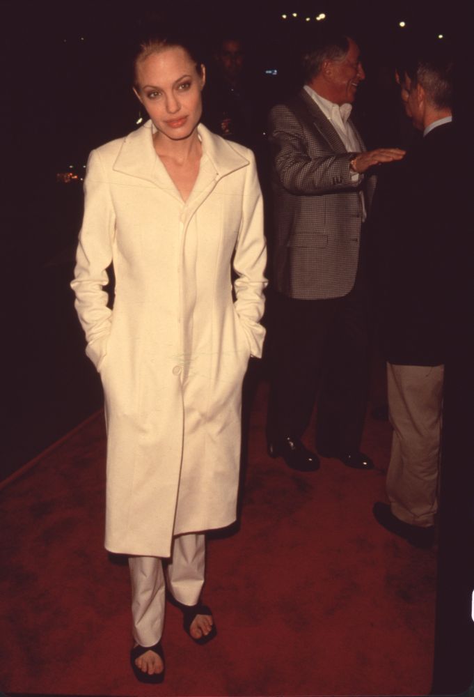 Angelina Jolie elegant photo print in long white coat