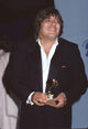 Jose Feliciano holding Grammy Award photo print.