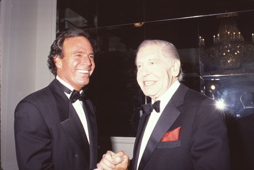 Julio Iglesias shaking hands with Milton Berle photo print