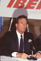 Julio Iglesias being interviewed sitting at a table photo print