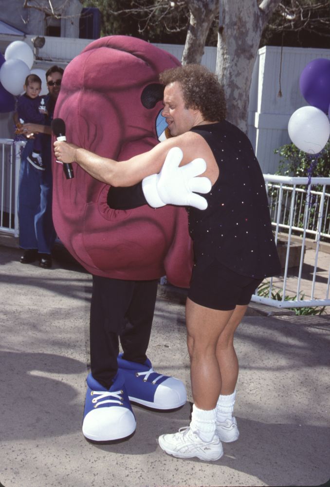 Richard Simmons Hugging Raisin Mascot Photo Print from Raisin Shine Workout