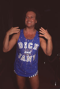 Richard Simmons in blue tank top and striped shorts photo print