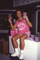 Richard Simmons photo print sitting with VHS tapes from Sweatin' to the Oldies