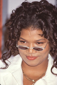 Queen Latifah closeup photo print in white jacket and sunglasses.