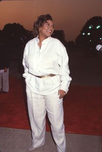 Queen Latifah in all white long sleeve outfit at the 26th NAACP Image Awards photo print.