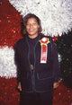 Queen Latifah in quilted vest at the 62nd Christmas Parade photo print