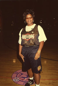 Queen Latifah in basketball shorts and jersey at Rock N' Jock B-Ball Jam Photo Print