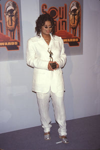 Queen Latifah holding award in white suit at 9th Soul Train Awards photo print.