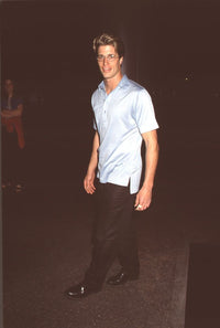 Rib Hillis in blue polo and black pants at 'Me & Will' premiere photo print.