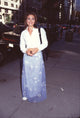 Susan Ward Daytime Emmys photo print in white top and sheer skirt.