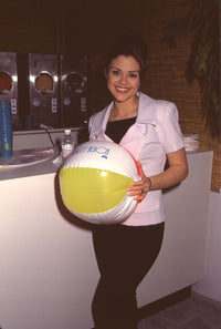 Susan Ward holding beach ball photo print, vibrant summer decor
