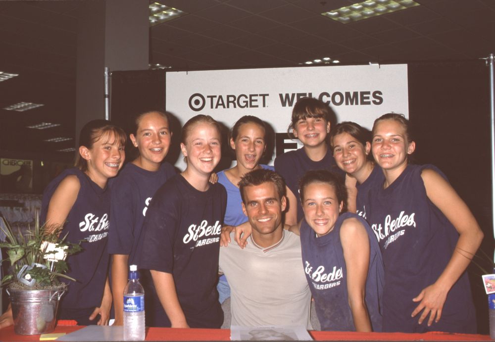 Cameron Mathison with girls team at autograph signing photo print.