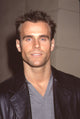 Cameron Mathison photo print in gray shirt and black leather jacket